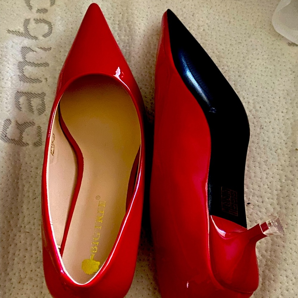 Red dress shoes brand new never worn.